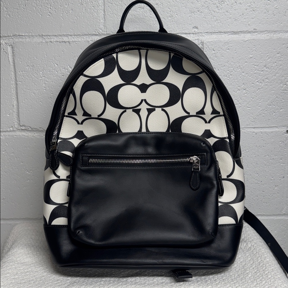 Coach Men’s Black and Cream Leather Backpack